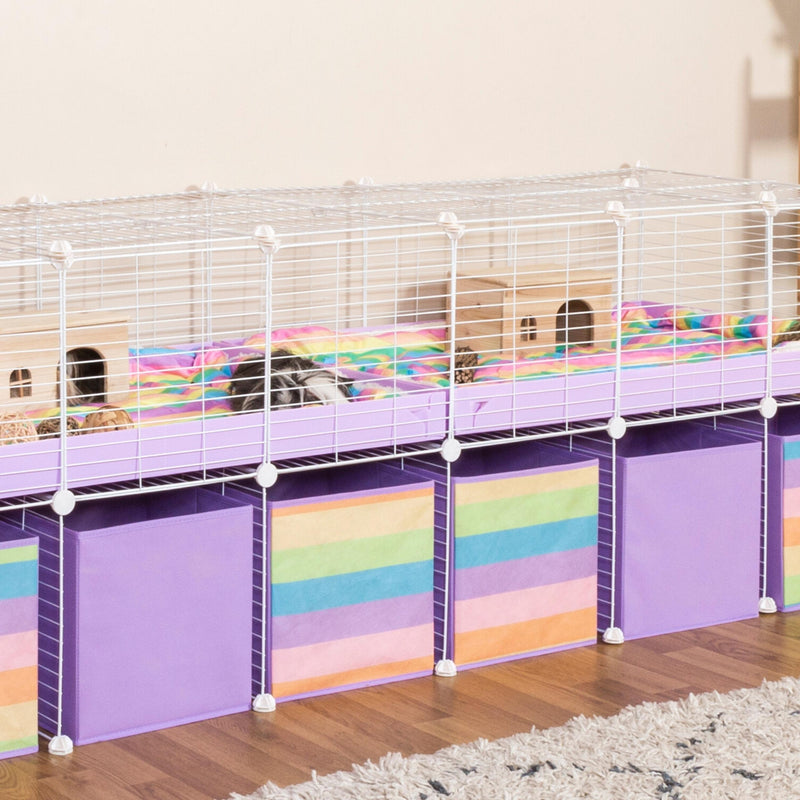 close up of a white 6x2 C&C cage for guinea pigs with stand and rainbow boxes lilac coroplast from kavee