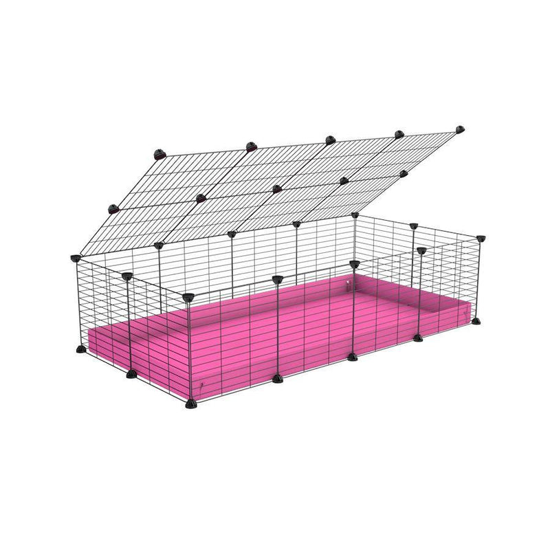 A 2x4 C and C cage for guinea pigs with pink coroplast a lid and small hole grids from brand kavee