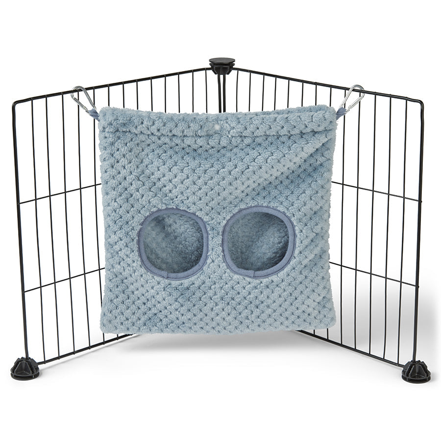 a guinea pig haybag hung on C&C cage made of blue fleece by kavee