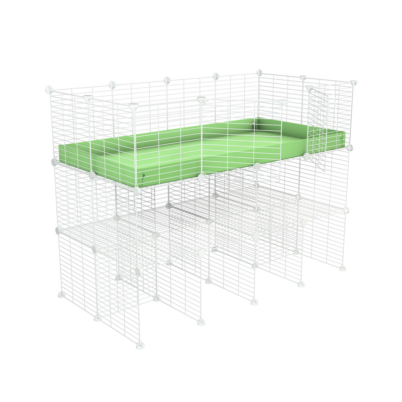 A 2x4 kavee C&C guinea pig cage with double stand green coroplast made of baby bars safe white grids