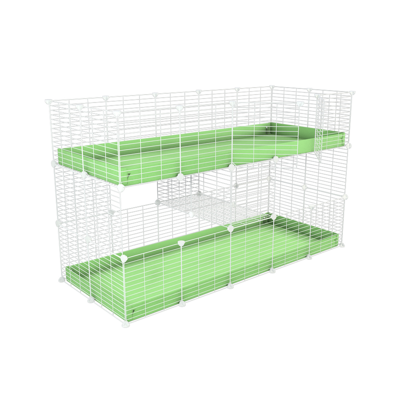 A two tier white 5x2 c&c cage for guinea pigs with two levels green pastel correx baby safe grids by brand kavee in the USA