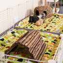 a white C&C cage with green fleece liner with guinea pigs from kavee