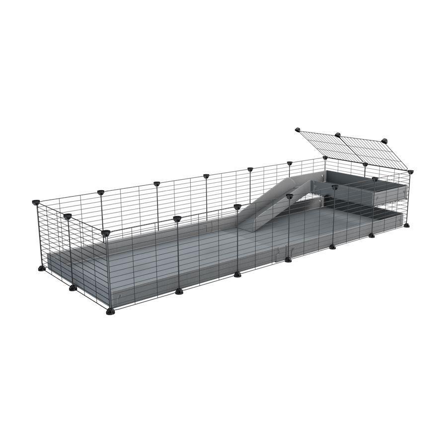 a 6x2 C&C guinea pig cage with a loft and a ramp gray coroplast sheet and baby bars by kavee