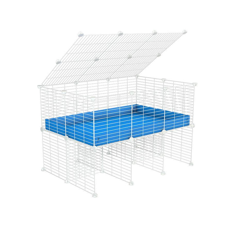 a 3x2 C&C cage for guinea pigs with a stand and a top blue plastic safe white C and C grids by kavee