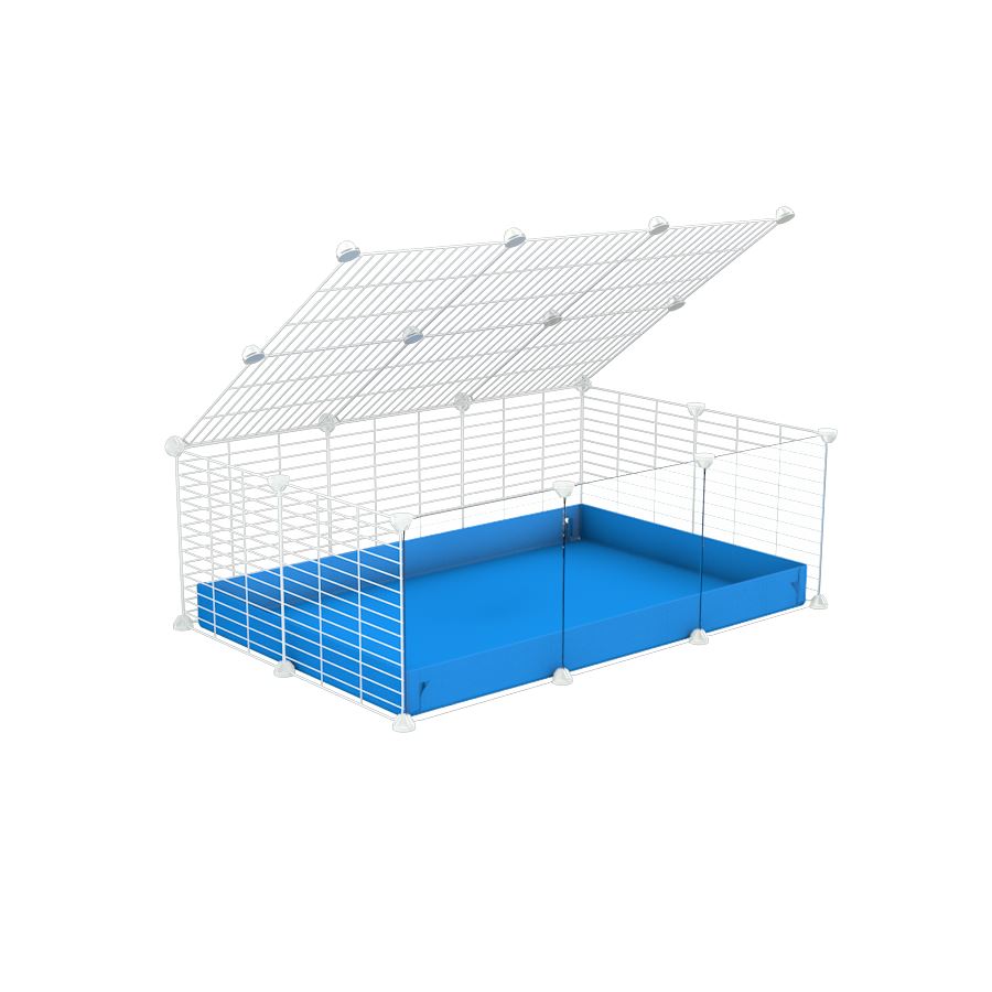 A 2x3 C and C cage with clear transparent plexiglass acrylic grids  for guinea pigs with blue coroplast a lid and small hole white C&C grids from brand kavee