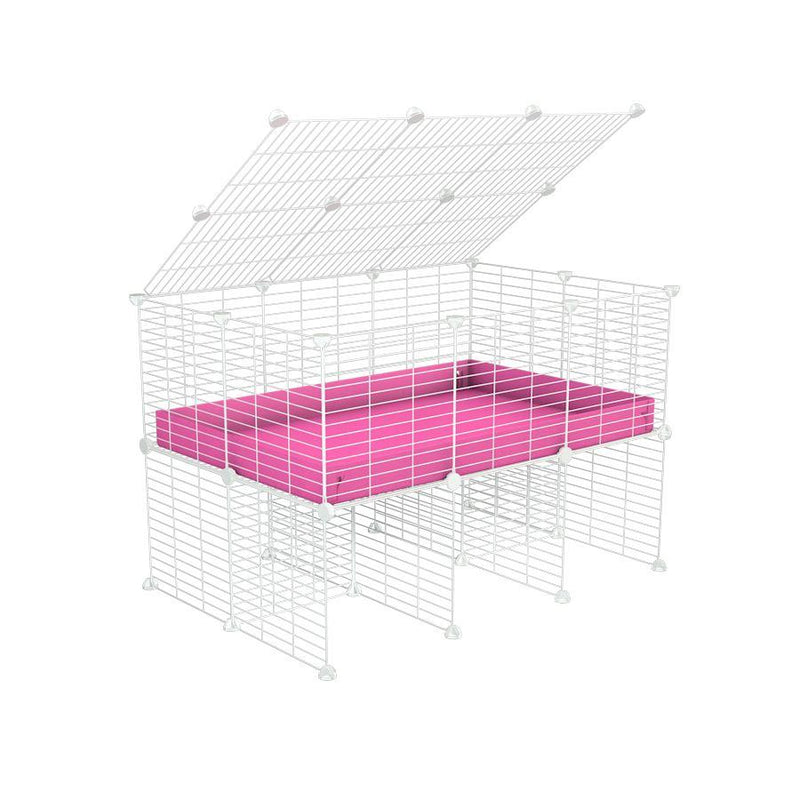 a 3x2 C&C cage for guinea pigs with a stand and a top pink plastic safe white grids by kavee