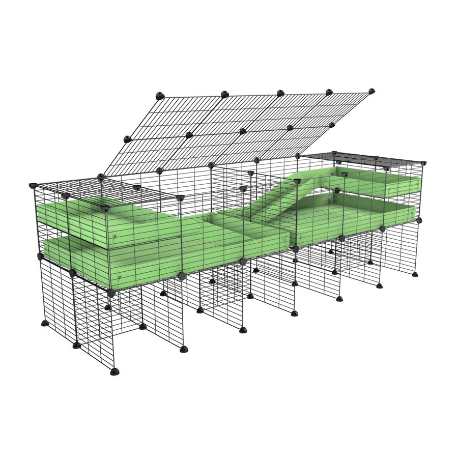 A 6x2 C&C cage with lid divider stand loft ramp for guinea pig fighting or quarantine with green coroplast from brand kavee