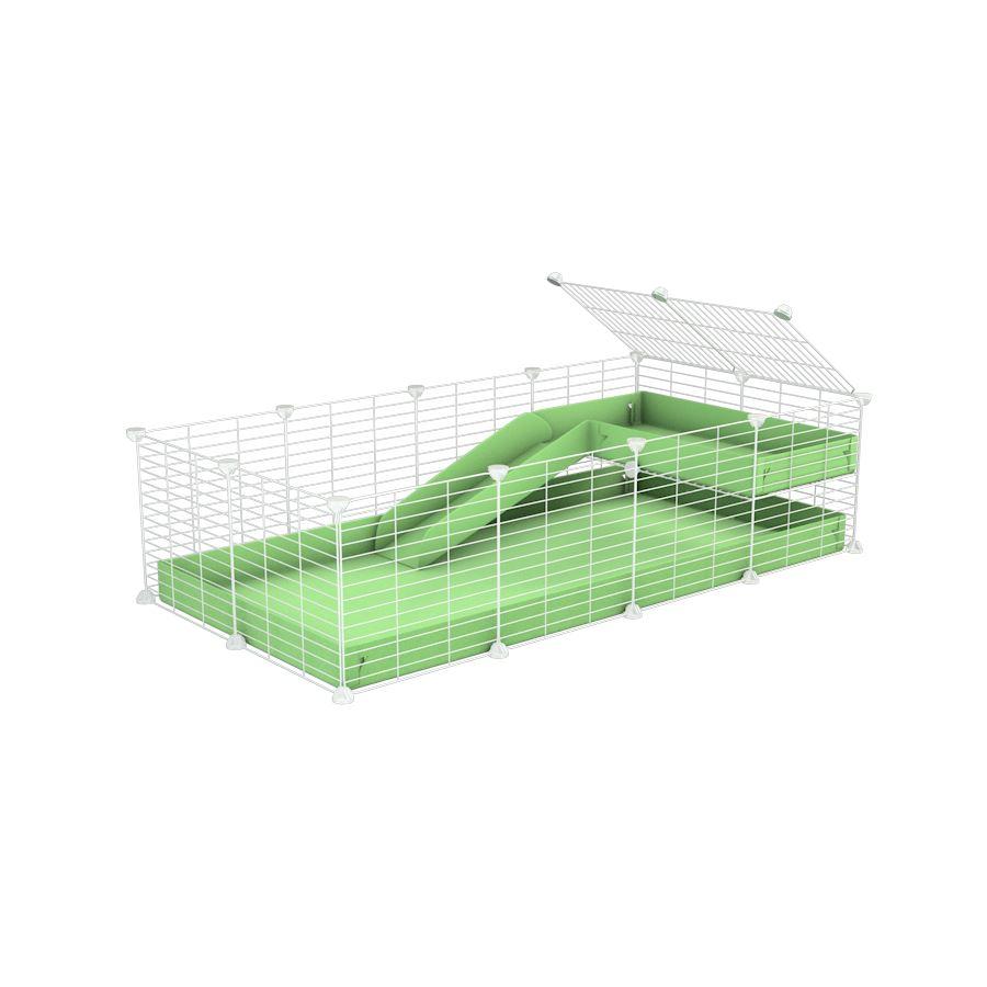 a 4x2 C&C guinea pig cage with a loft and a ramp green pastel pistachio coroplast sheet and baby bars by kavee