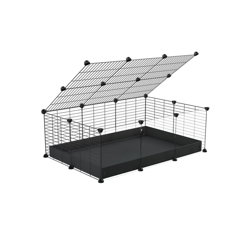 A 2x3 C and C cage with clear transparent plexiglass acrylic grids  for guinea pigs with black coroplast a lid and small hole grids from brand kavee