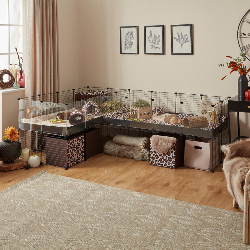 living room with kavee c and c double black grid cage with leopard and taupe print storage boxes liners and accessories
