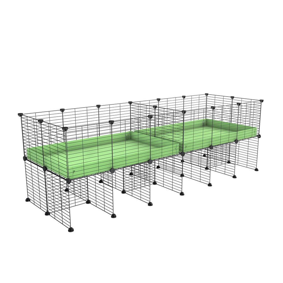 A 6x2 C&C cage with divider and stand for guinea pig fighting or quarantine with green coroplast from brand kavee