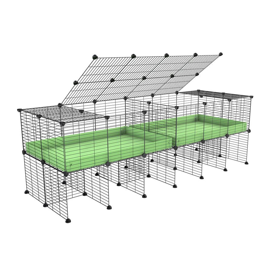 A 6x2 C&C cage with lid divider stand for guinea pig fighting or quarantine with green coroplast from brand kavee